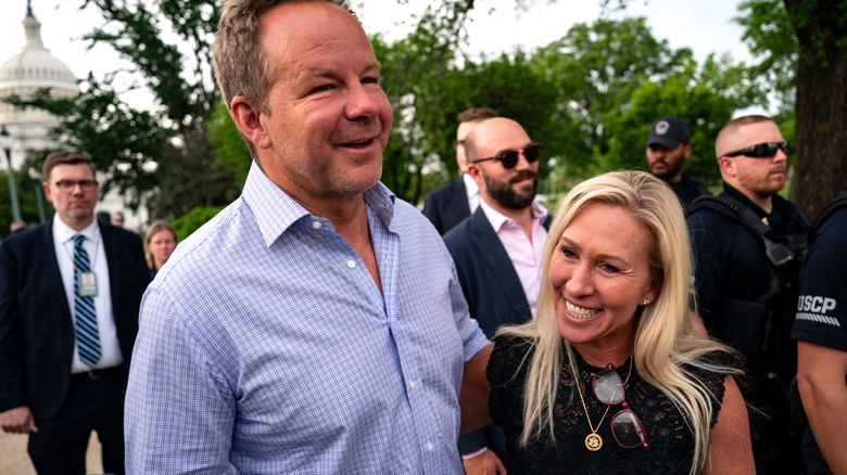 Marjorie Taylor Greene and Brian Glenn talking to members of the press on May 8, 2024