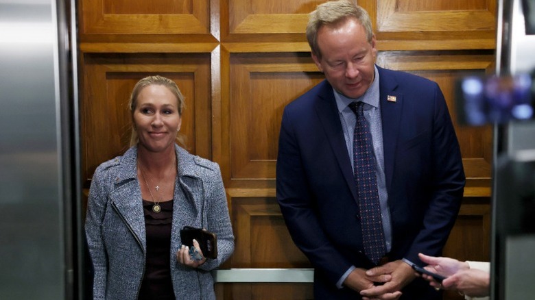 Marjorie Taylor Greene and Brian Glenn depart her office in Washington, DC (2025)