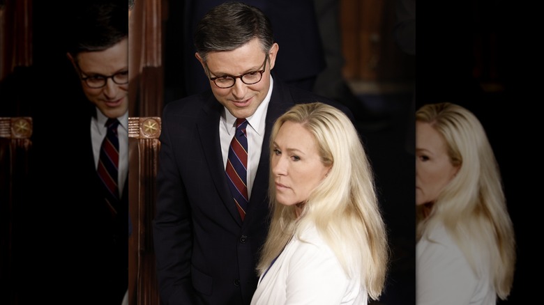 Mike Johnson talking to Marjorie Taylor Greene
