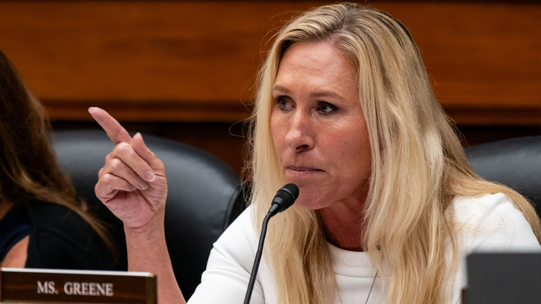 Marjorie Taylor Greene pointing a finger