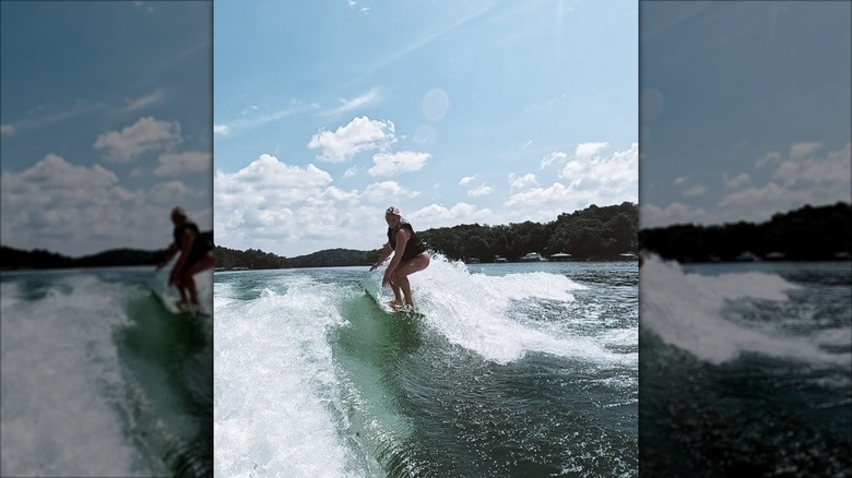 Lauren Greene Sanders surfing.