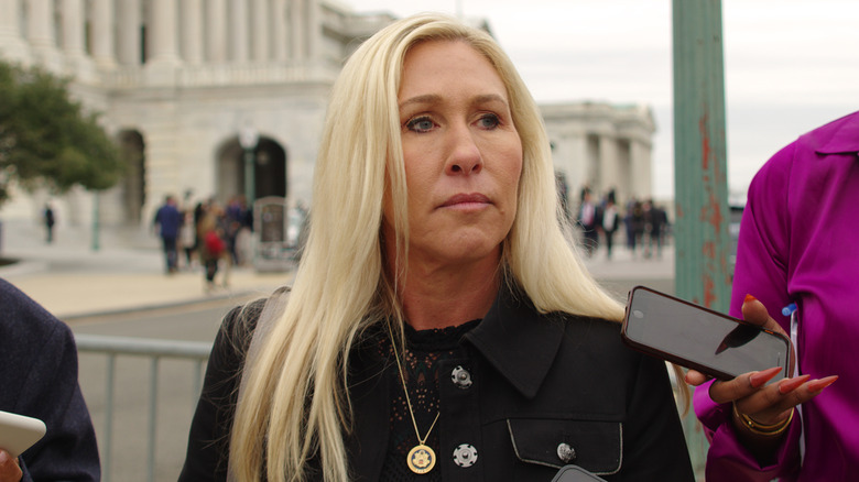 Marjorie Taylor Greene frowning