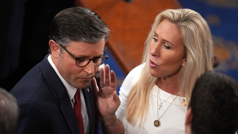 Marjorie Taylor Greene speaking to Mike Johnson