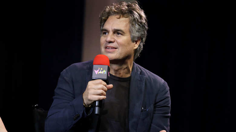 Mark Ruffalo speaking over a microphone