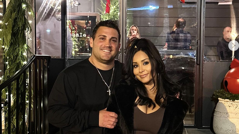 Snooki, right, with her husband Jionni LaValle