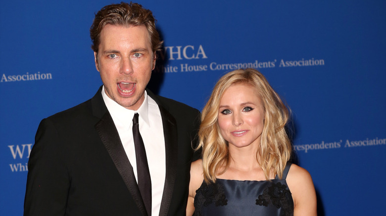 Dax Shepard and Kristen Bell posing together at an event