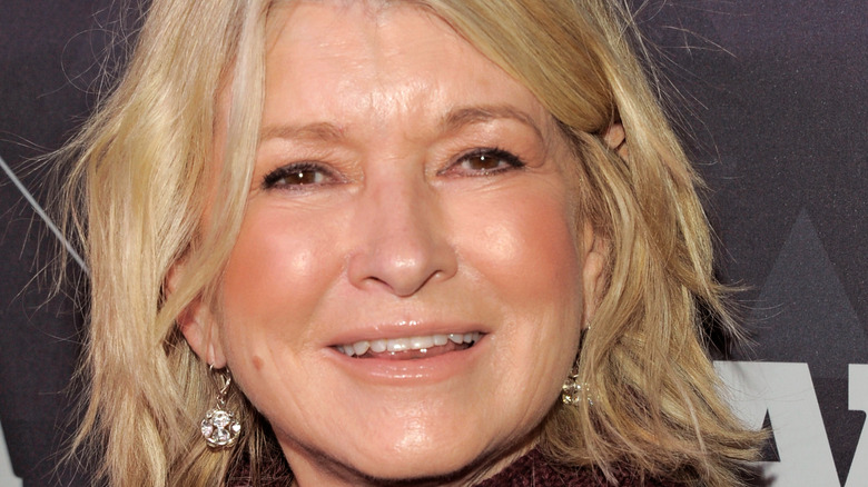 Martha Stewart smiling in diamond earrings 