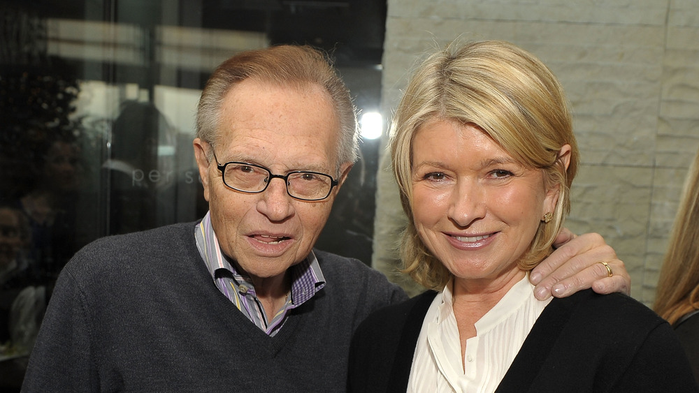 Martha Stewart and Larry King smiling together