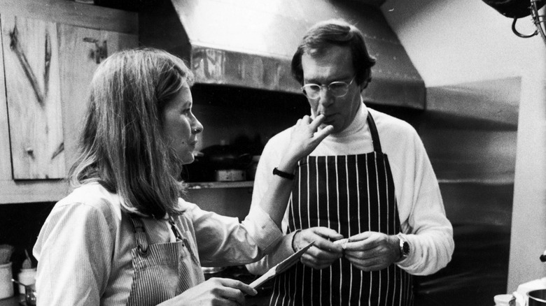Martha Stewart and husband, publisher Andy Stewart, baking in their kitchen.