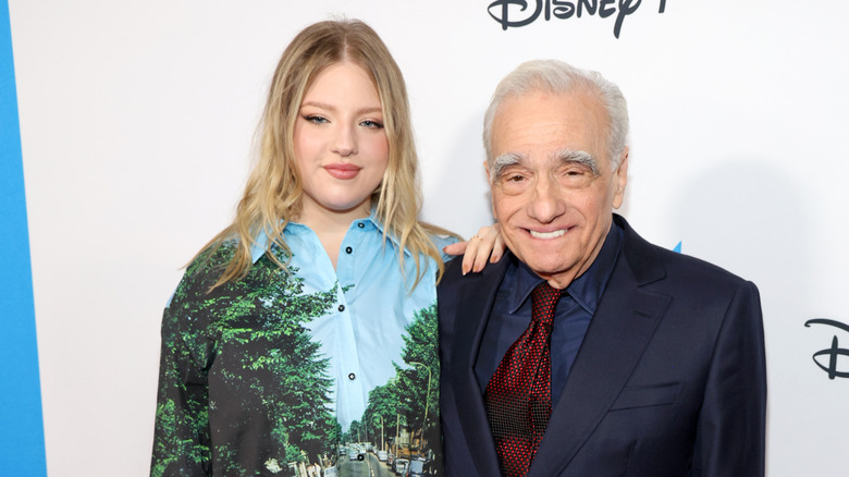 Francesca and Martin Scorsese posing on a Disney red carpet together
