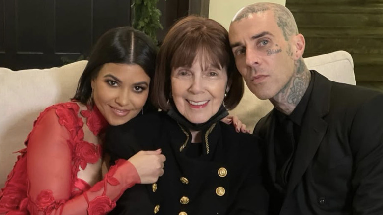 Mary Jo "MJ" Shannon posing with Kourtney Kardashian, Travis Barker