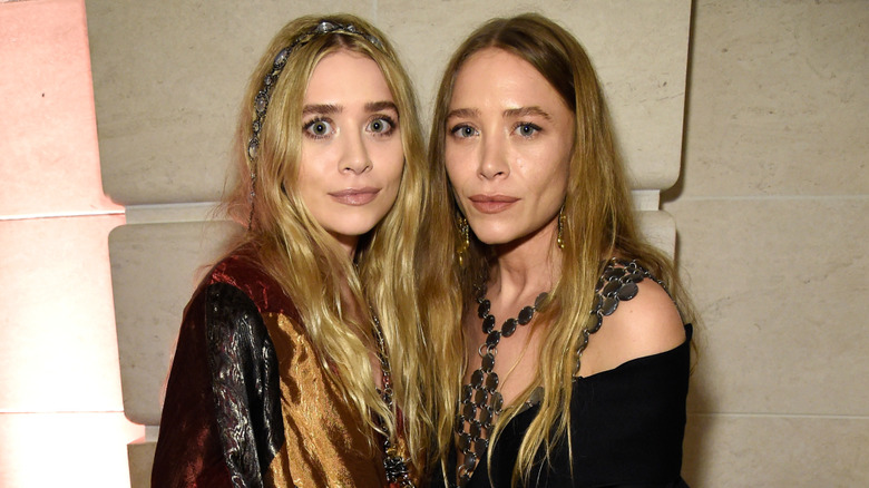 Mary-Kate and Ashley Olsen decked out in metallic looks.