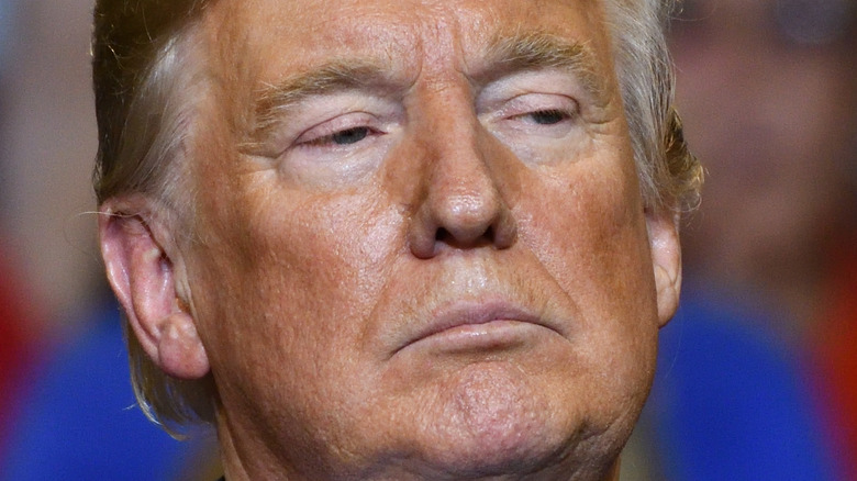 Donald Trump frowning