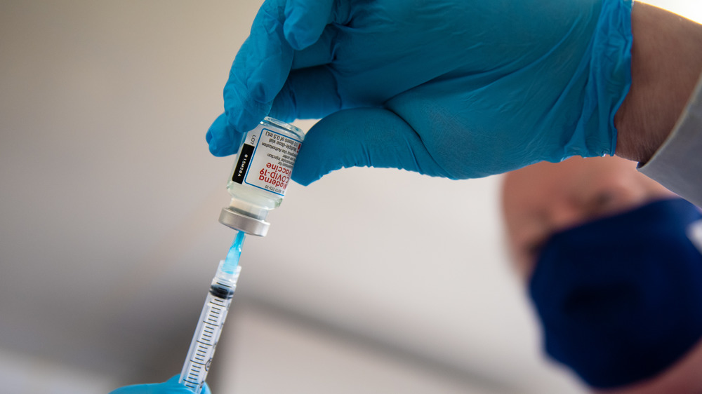 Doctor with the Moderna vaccine