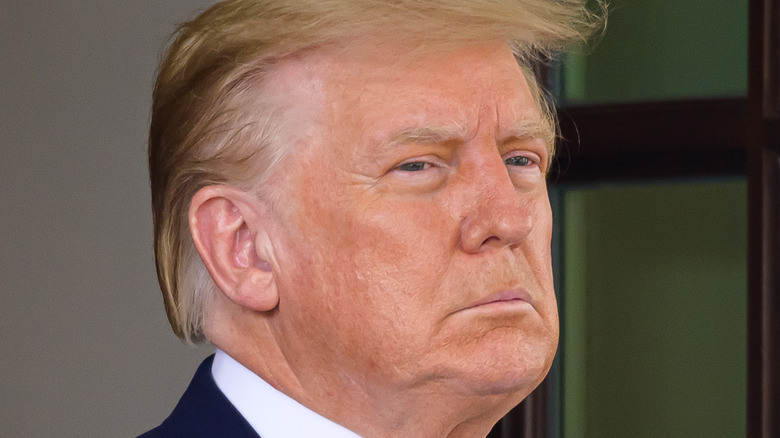 Donald Trump frowning