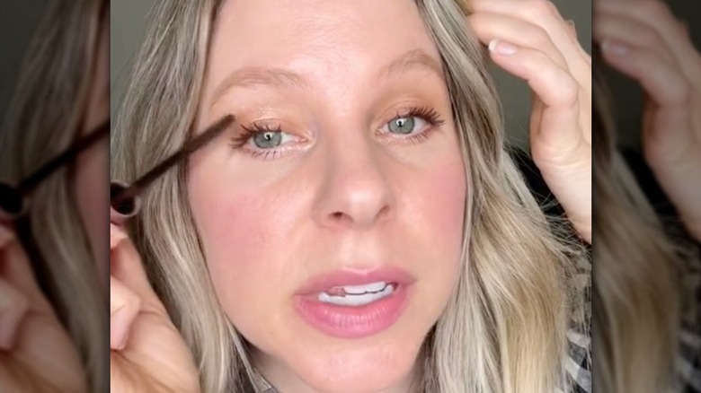 Brown mascara on grey eyes