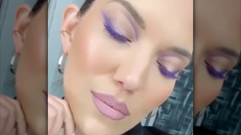 Grey eyes with purple mascara