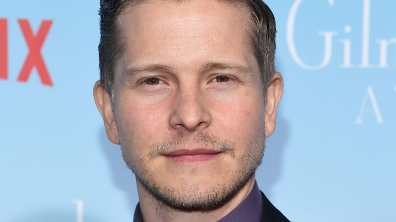 Matt Czuchry posing at event