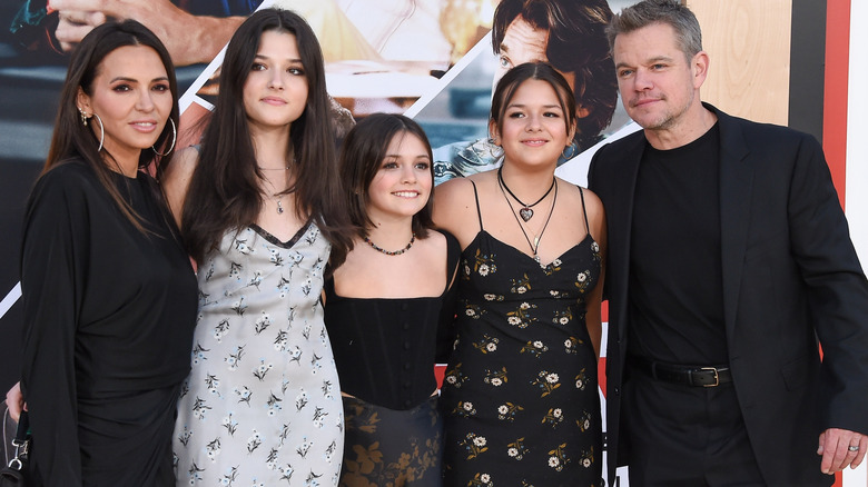 Matt Damon, Isabella Damon, Stella Damon, Gia Damon, and Luciana Barroso smiling at a premiere for Air