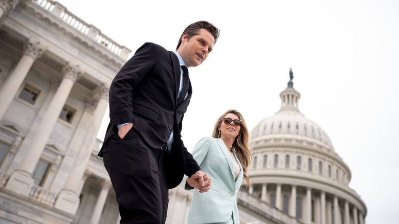 Ginger Gaetz and Matt Gaetz walking while holding hands