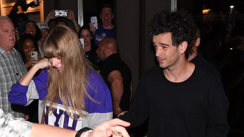 Taylor Swift walking with Matty Healy