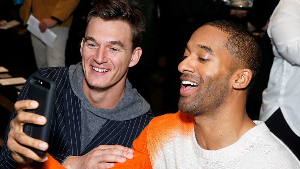 Matt James and Tyler Cameron laugh together