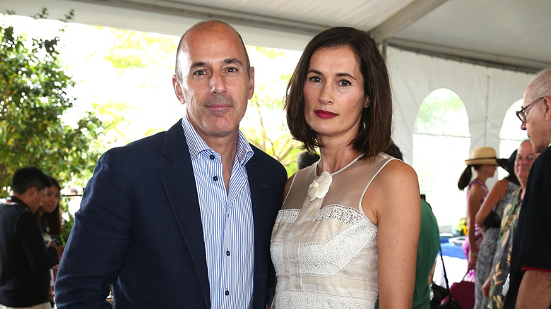 Annette Roque and Matt Lauer posing together at an event