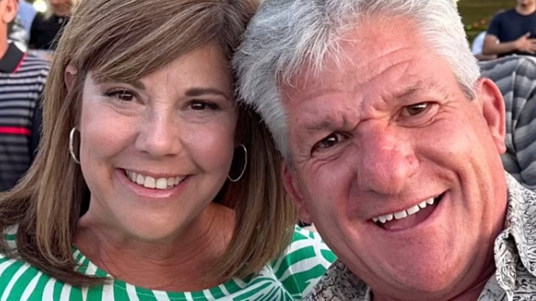 Caryn Chandler smiling with Matt Roloff