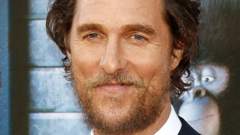 Matthew McConaughey smiling on the red carpet. 