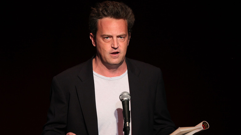 Matthew Perry talking at an event