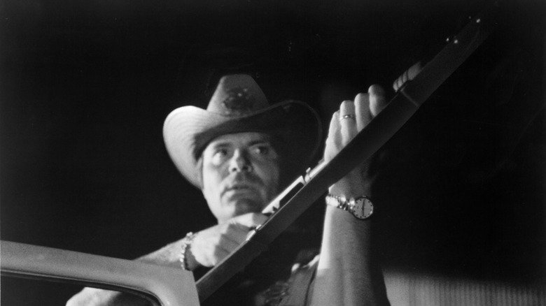 Black and white photo of Max Baer Jr in Macon County Line in 1974