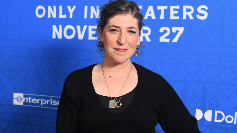 Mayim Bialik smiling at the premiere of 