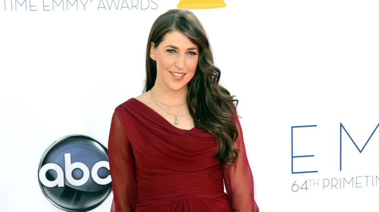 Mayim Bialik smiling at the 2012 Emmy Awards ceremony