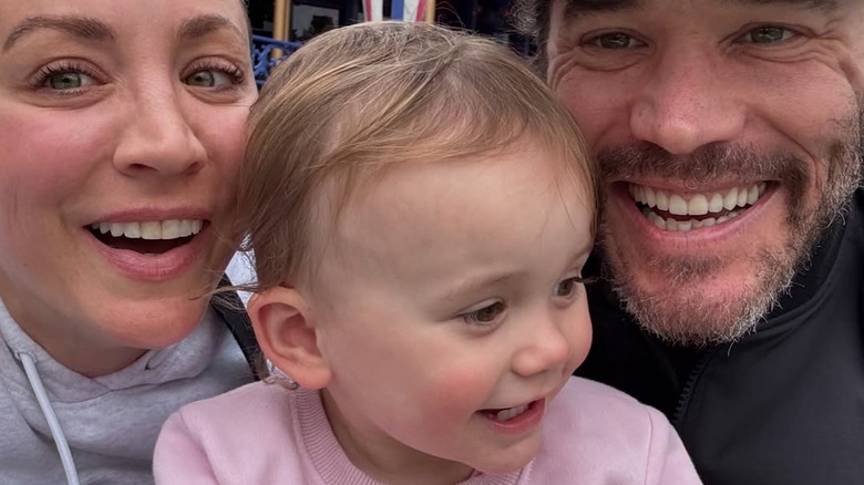 Kaley Cuoco taking a selfie with her fiancé and baby daughter