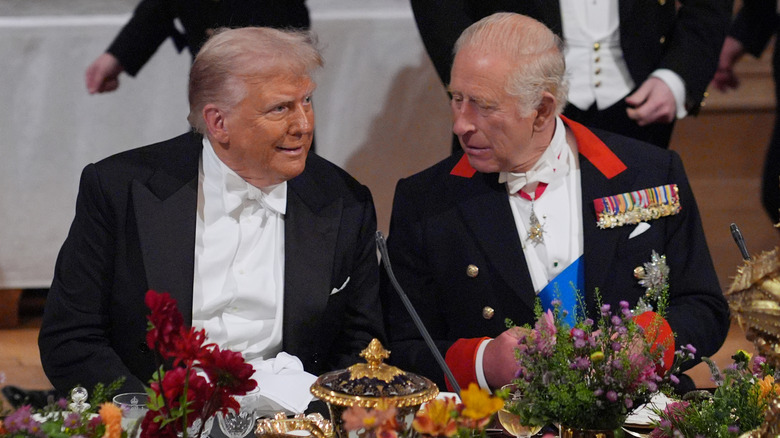Donald Trump speaking to King Charles at the state banquet in the UK