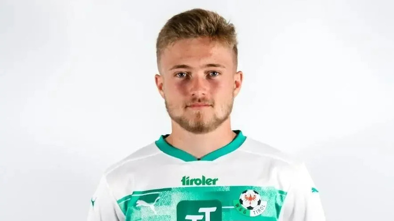 Promotional image of Mathew Collins in a football (soccer) jersey.