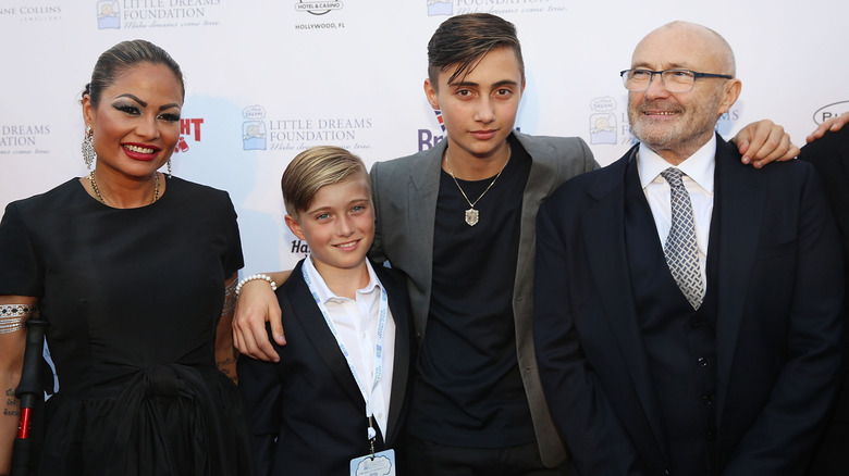 Phil, Orianne, Nic, and Mathew Collins attending an event in 2016.