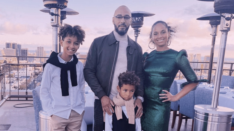 Swizz Beatz and Alicia Keys with their sons