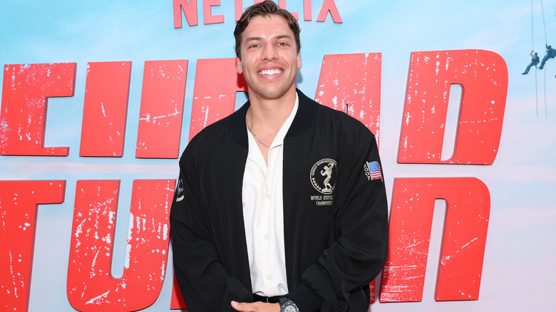 Joseph Baena smiling for photos