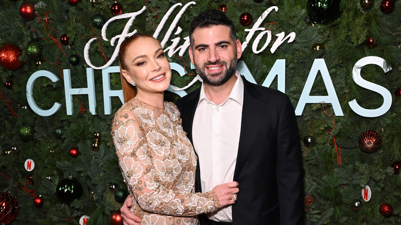 Lindsay Lohan poses with Bader Shammas at an event