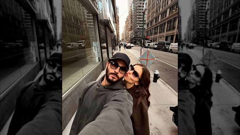 Ben Attal taking a selfie and standing next to Thylane Blondeau