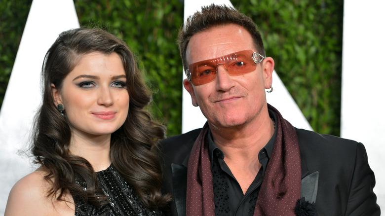 Eve Hewson poses with dad Bono at an event