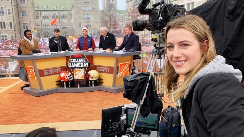 Lily O'Donnell smiling behind the scenes of an ESPN broadcast
