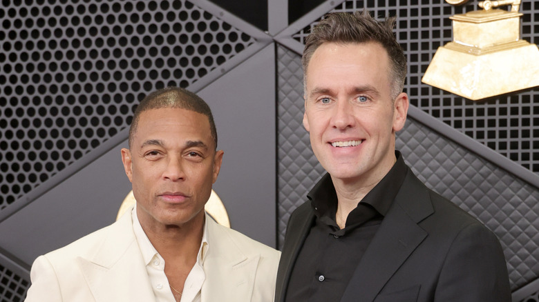 Don Lemon wearing white and Tim Malone wearing black