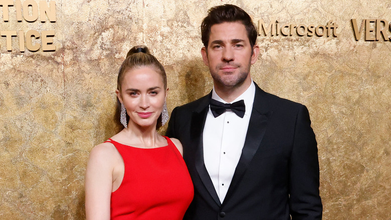 John Krasinski and Emily Blunt at a red carpet