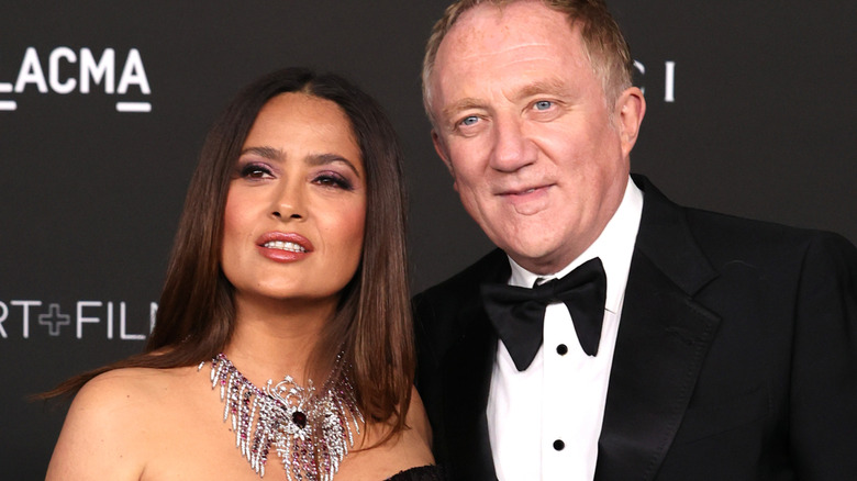 Salma Hayek and François-Henri Pinault posing at an event