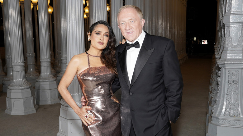 François-Henri Pinault and Salma Hayek posing