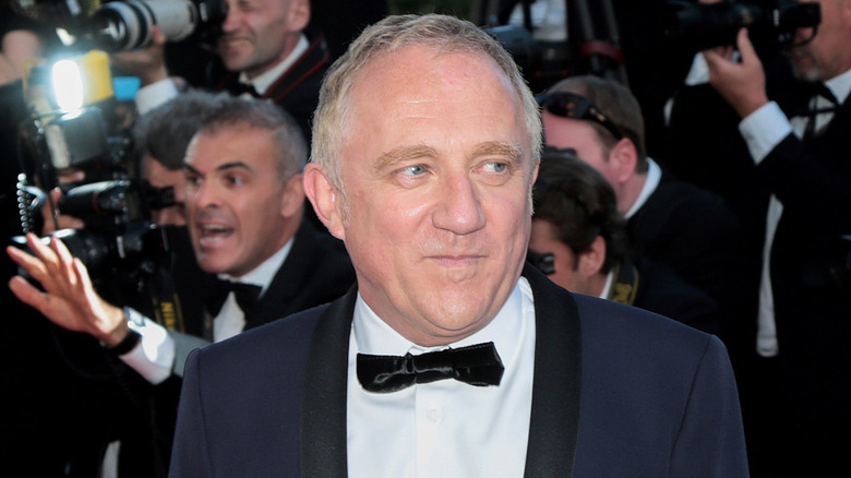 François-Henri Pinault in tux with photographers