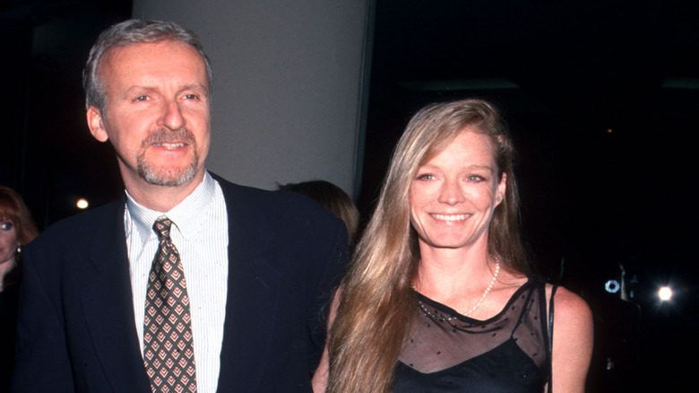 James Cameron photographed with Suzy Amis in 1998