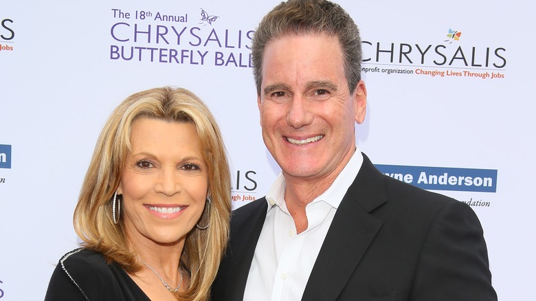 John Donaldson and Vanna White smile on the red carpet together
